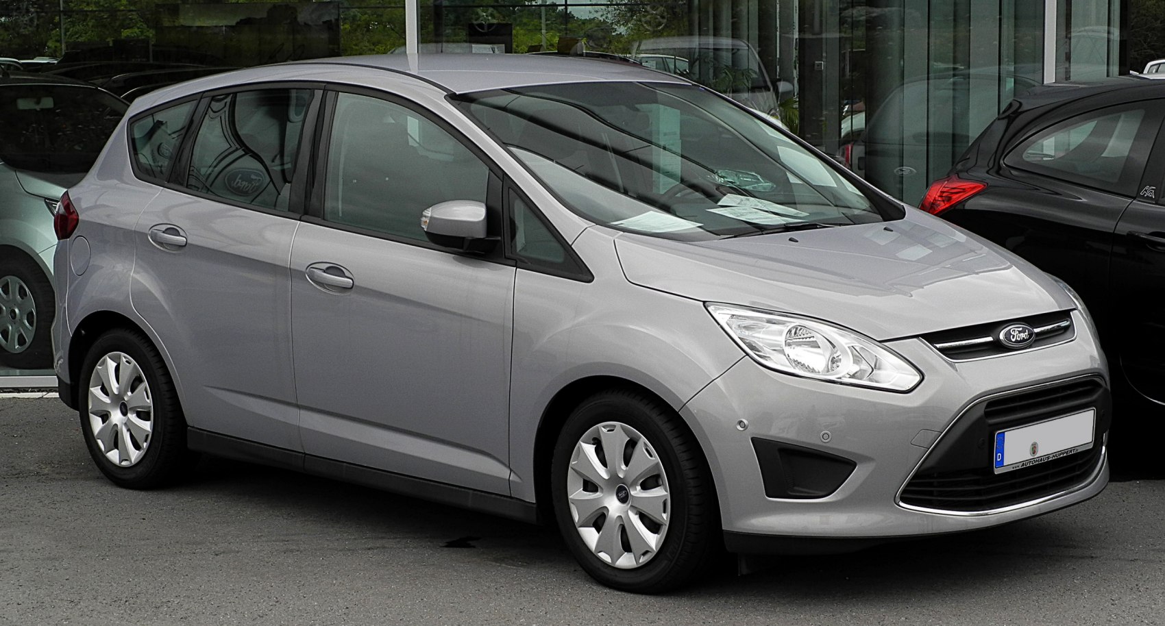 Silver compact MPV with front side profile and five-door layout