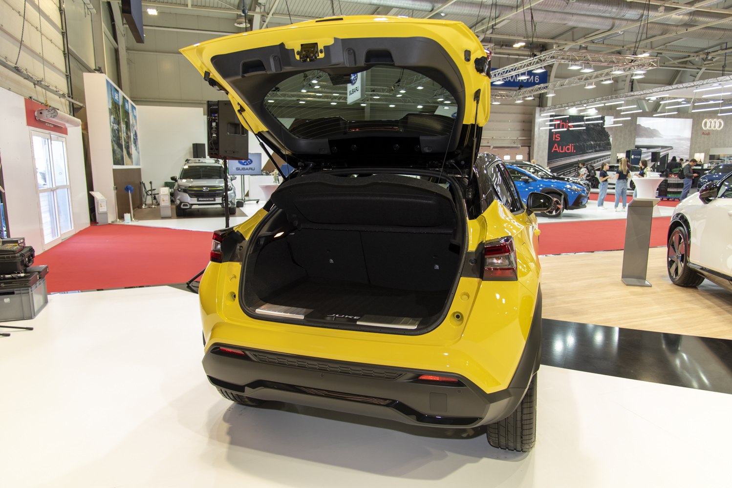 Open rear trunk with spacious cargo area and modern rear design.