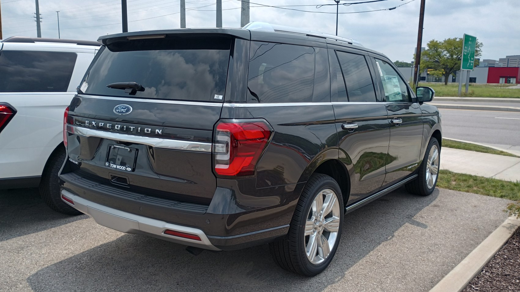 Rear view of a full-size SUV with chrome trim and angular tail lights