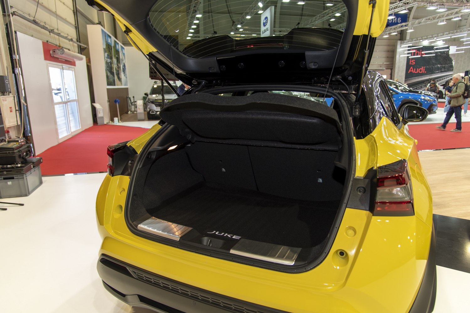 Open rear trunk with spacious cargo area and hatchback tailgate
