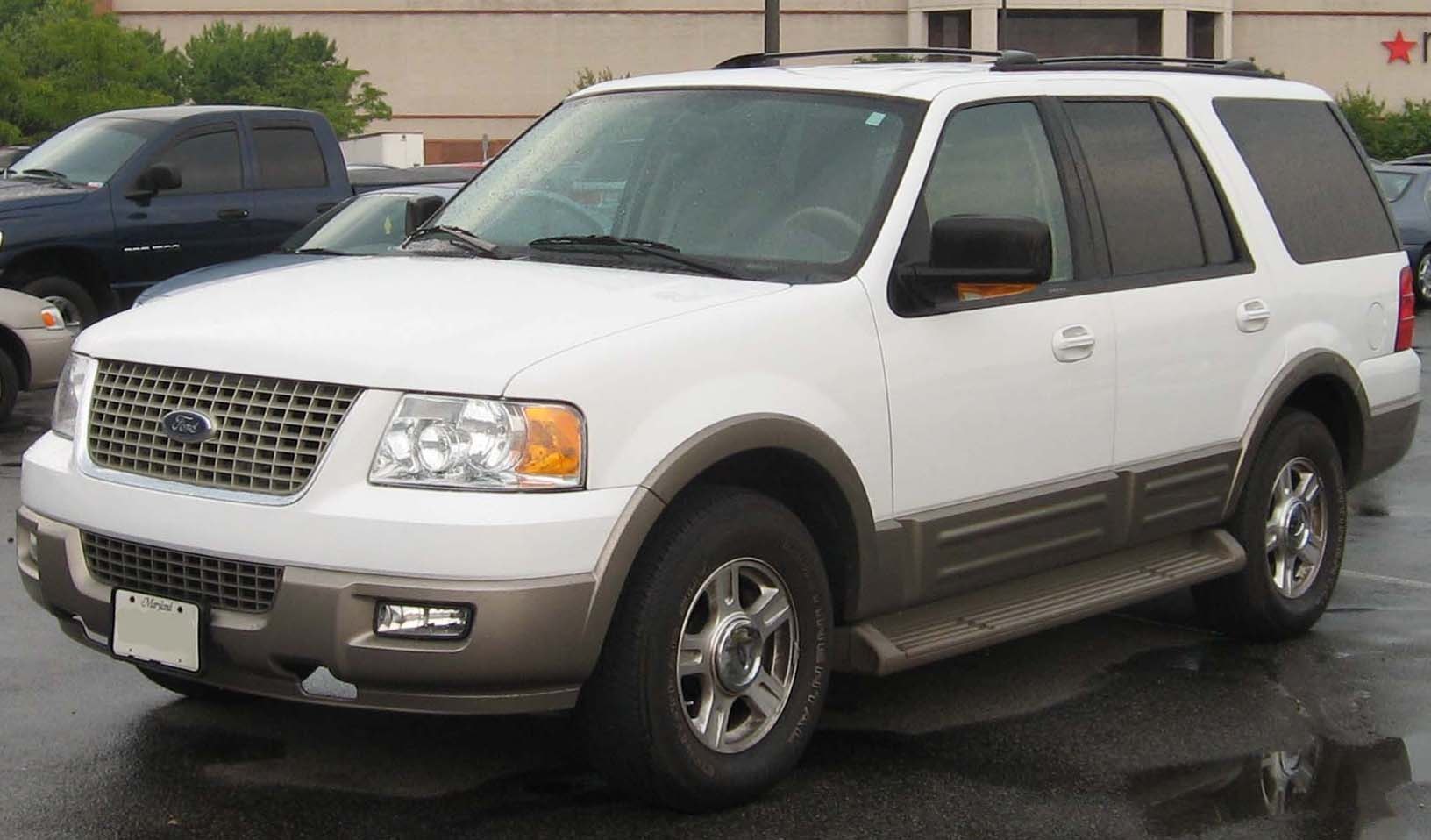 White SUV with brown lower trim and alloy wheels front-left side view