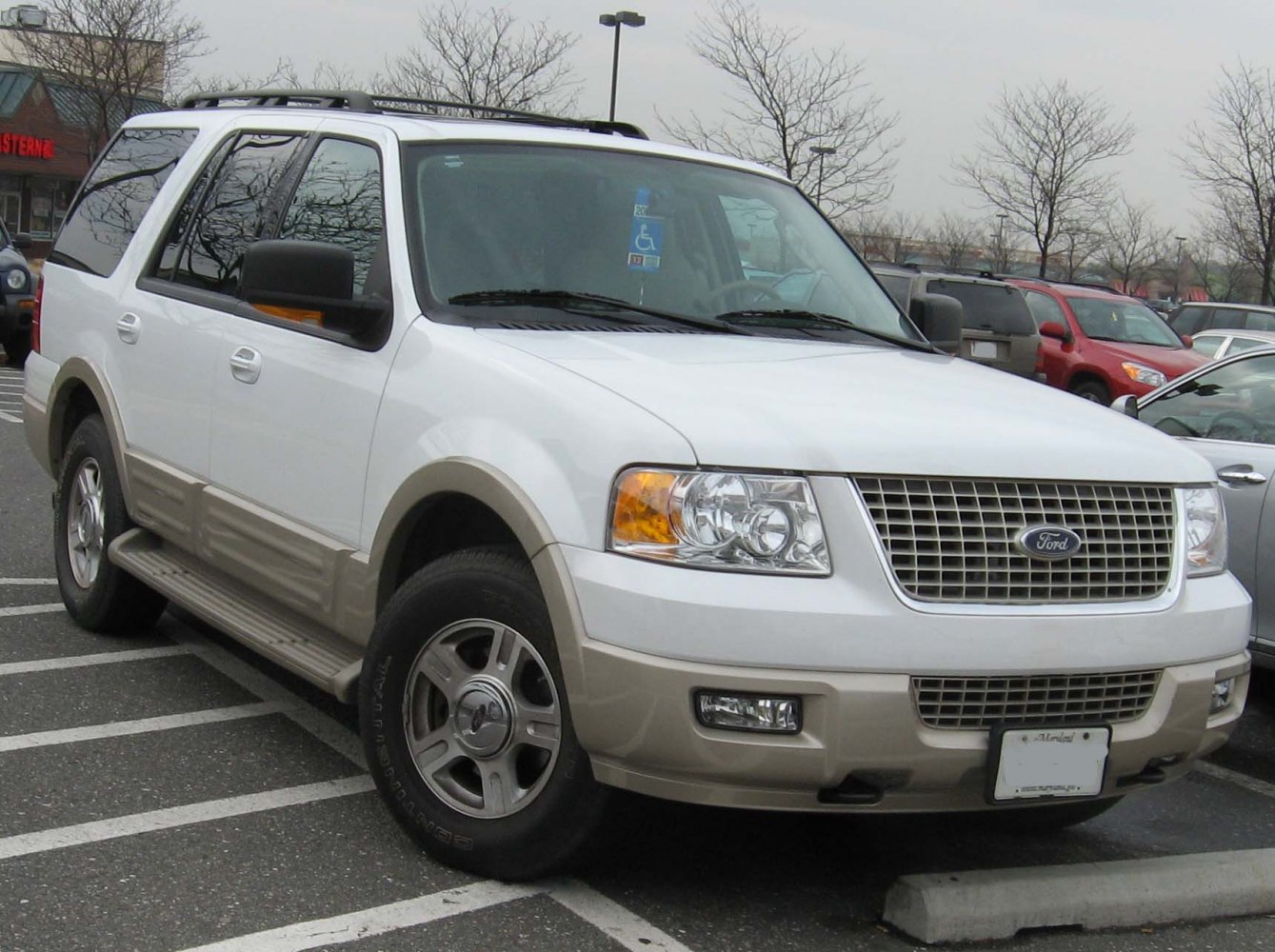 SUV front profile with dual-tone bumper and large grille