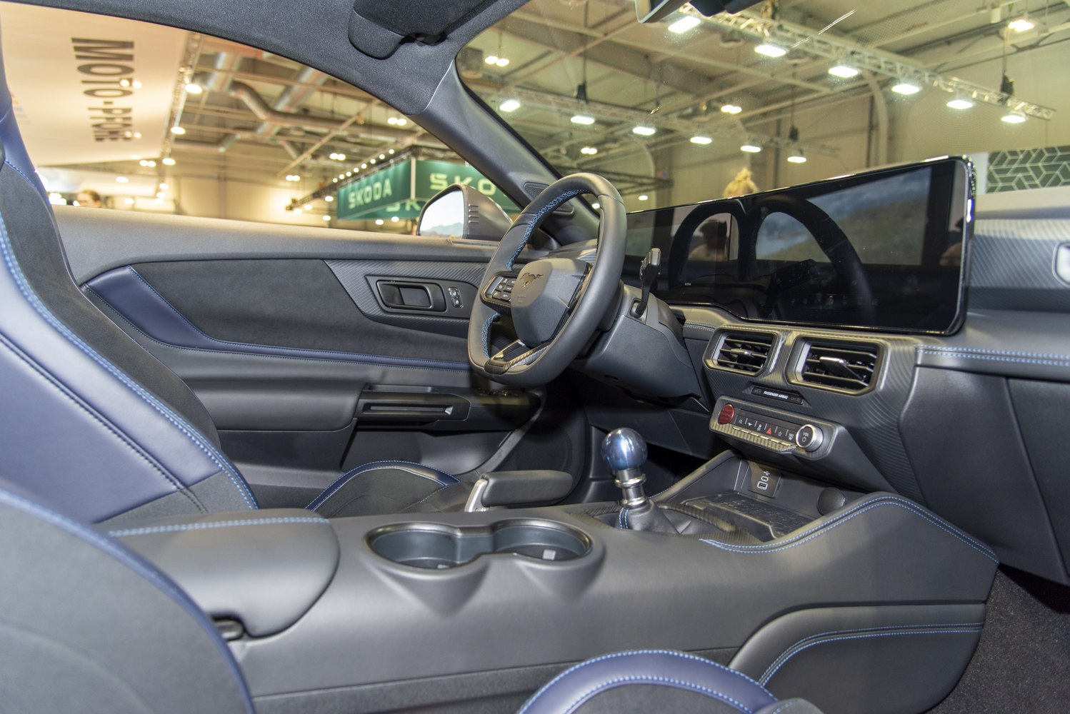 Digital dashboard and manual gearbox in modern sporty interior