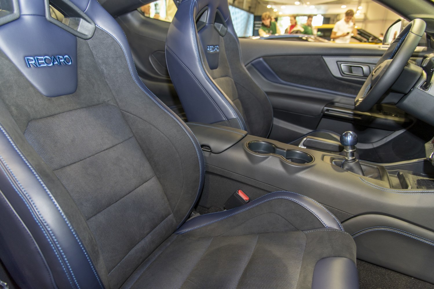 Recaro sport seats and manual gear shifter inside car interior