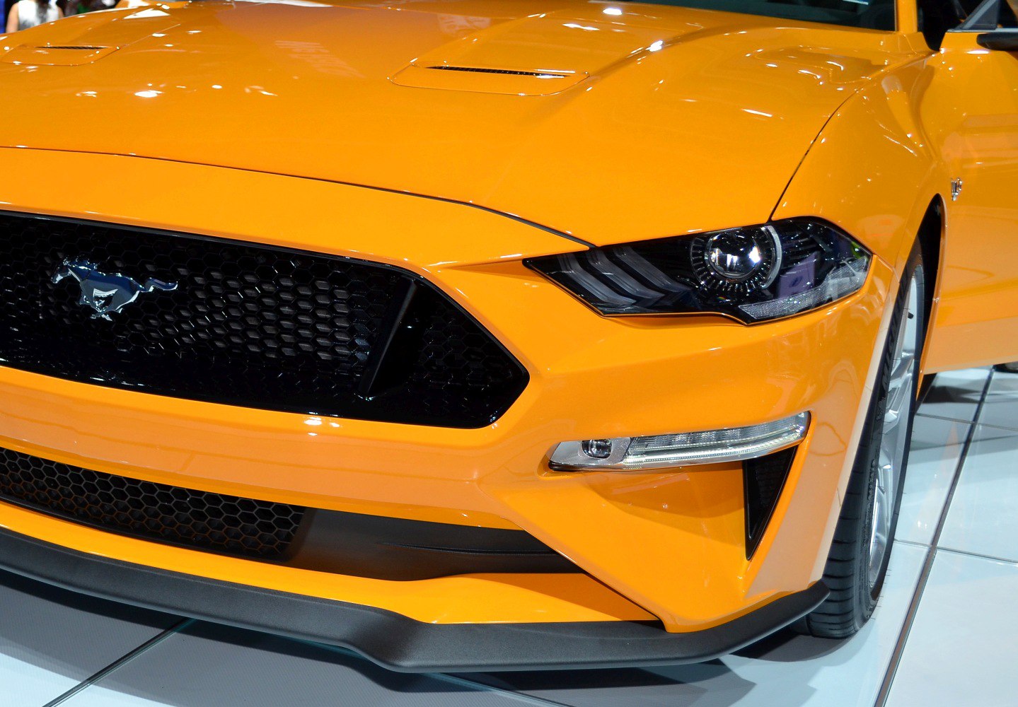 Close-up of aggressive front grille and headlight design