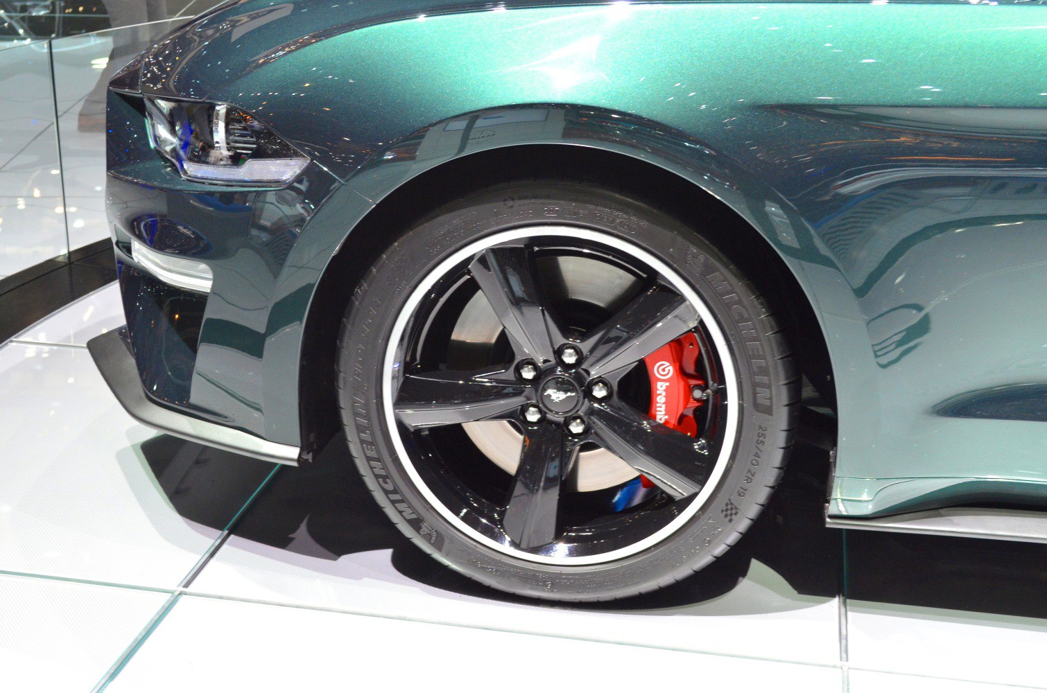 Black alloy front wheel with Brembo brake caliper and Michelin tire