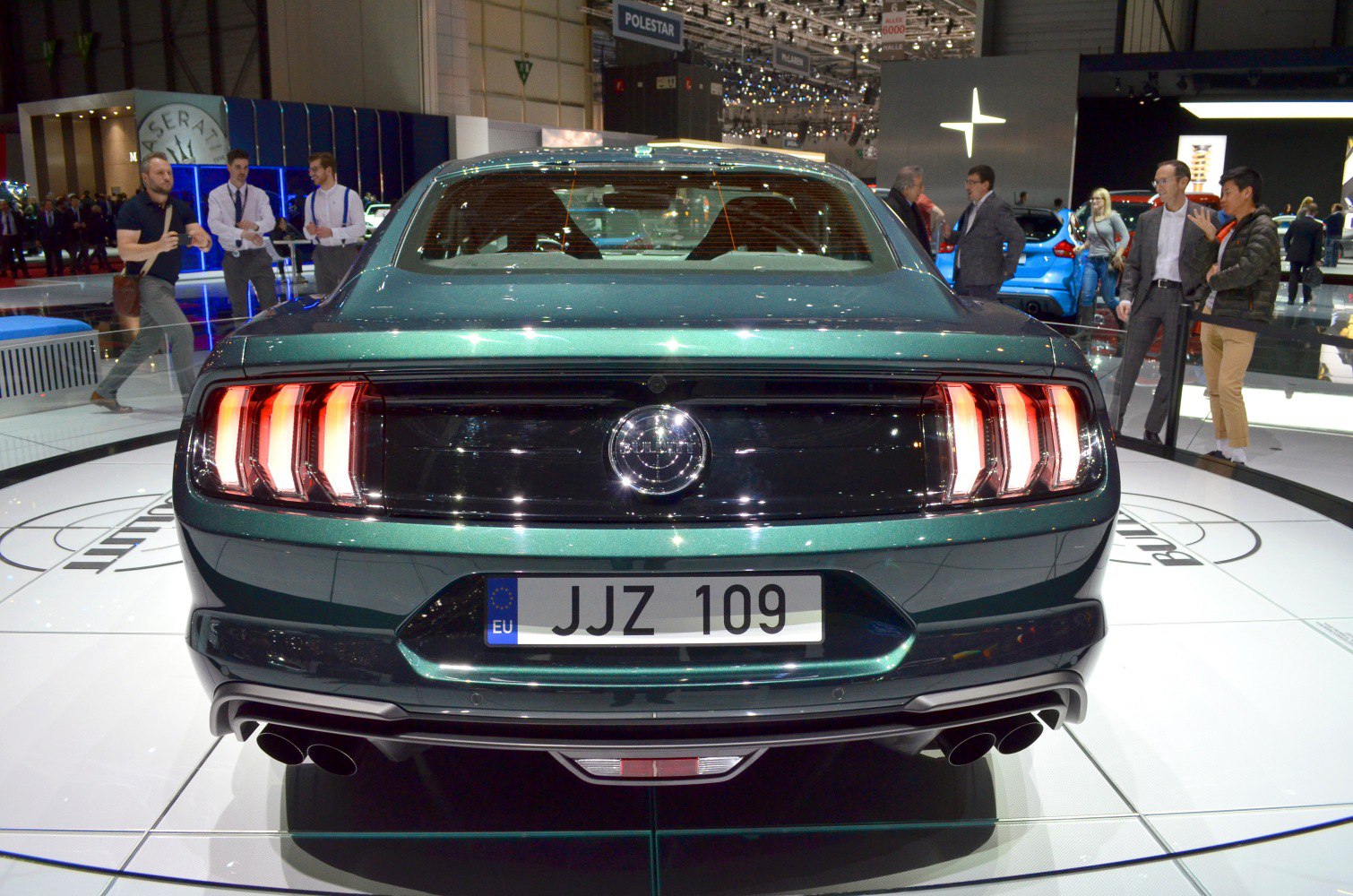 Rear view with triple bar taillights and quad exhaust pipes