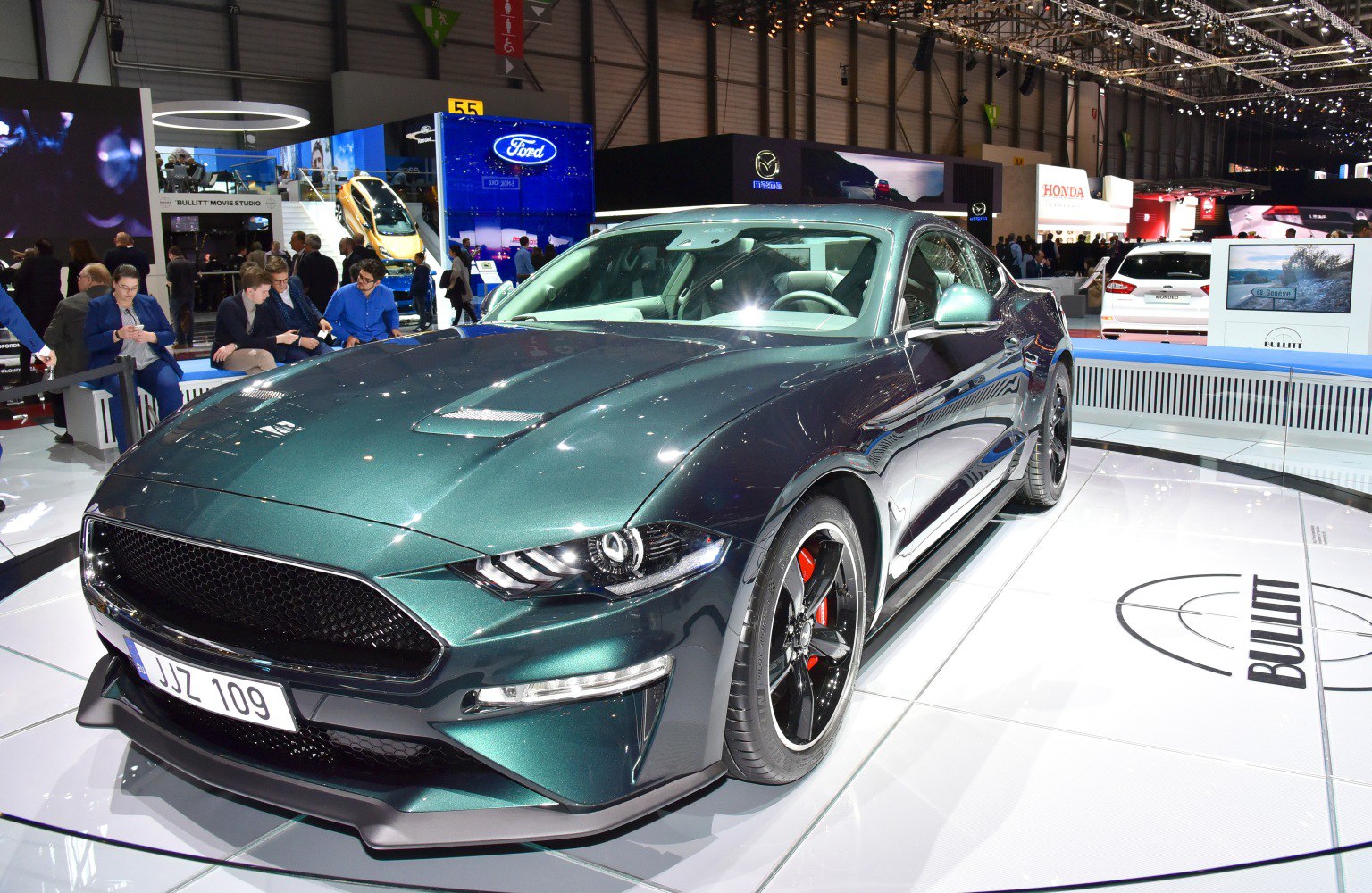Sporty fastback with LED headlights and aggressive front grille