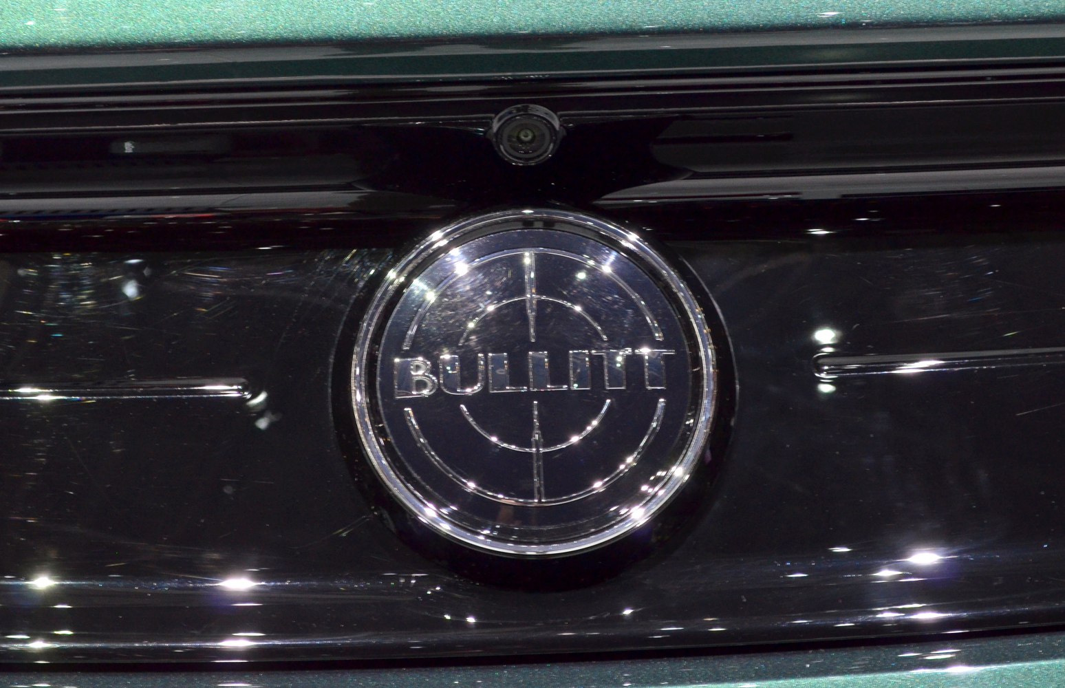 Close-up of Bullitt badge on car grille