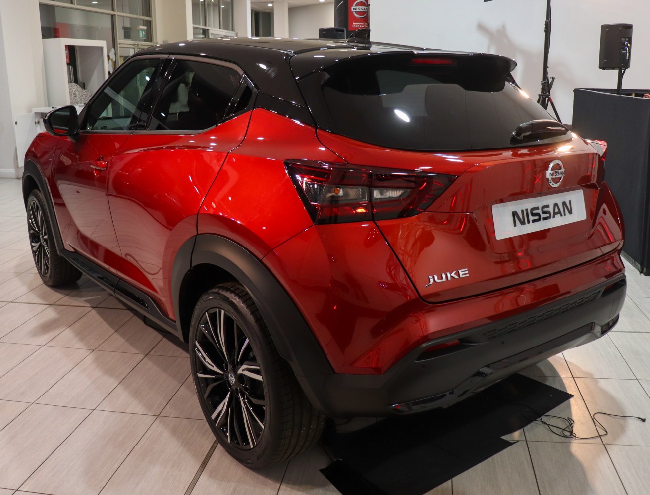 Rear side view with angular design, dual-tone body, black alloy wheels