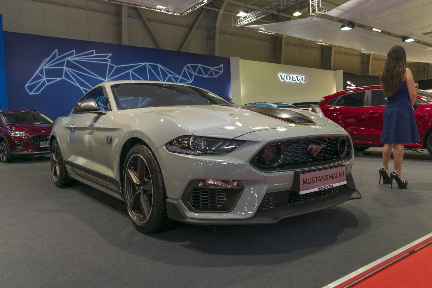 Aggressive front grille and sporty exterior with performance accents.