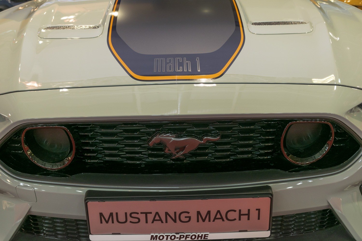 Close-up of Mustang Mach 1 front grille and hood decal