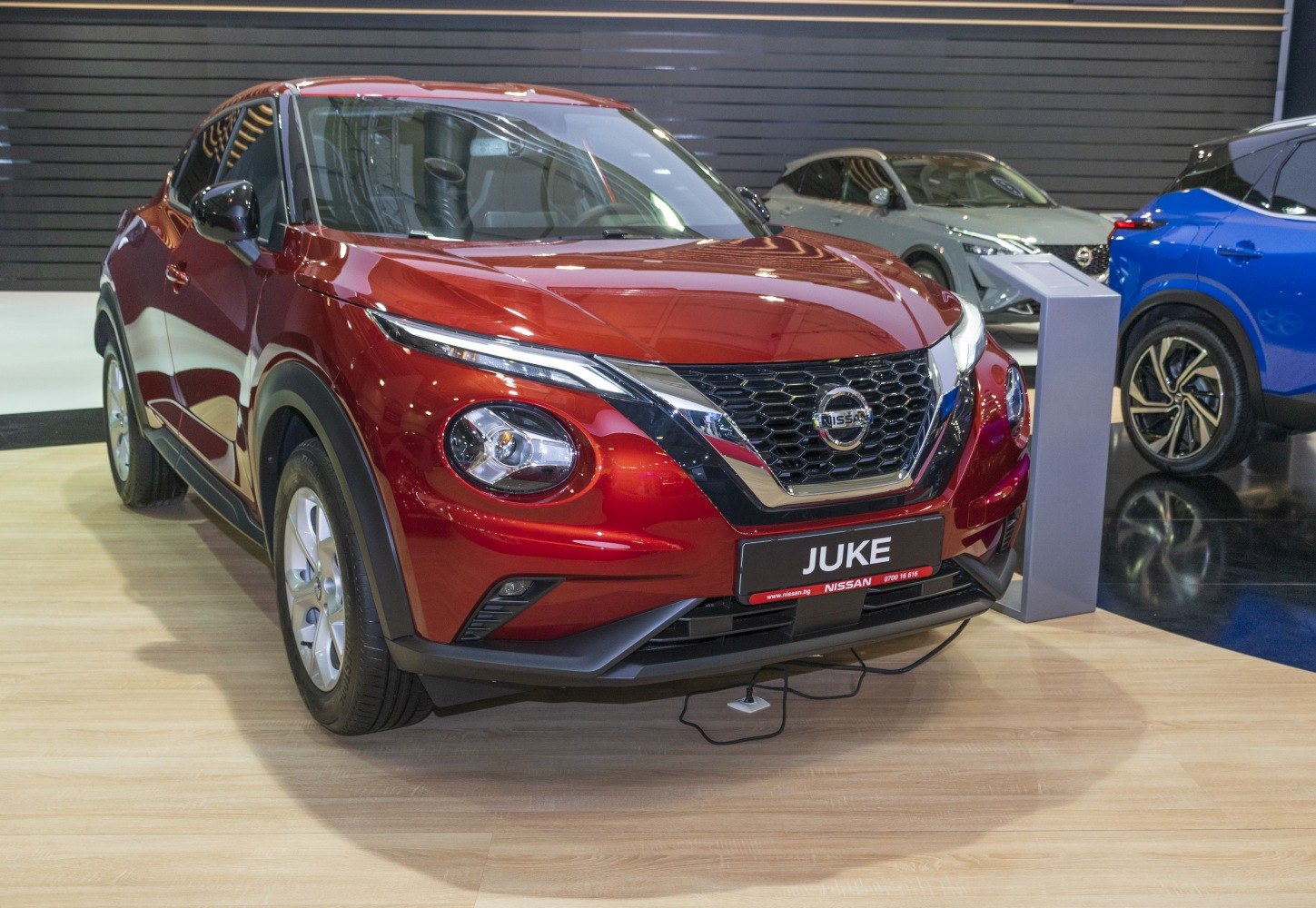 Front view of compact SUV with LED headlights and bold grille