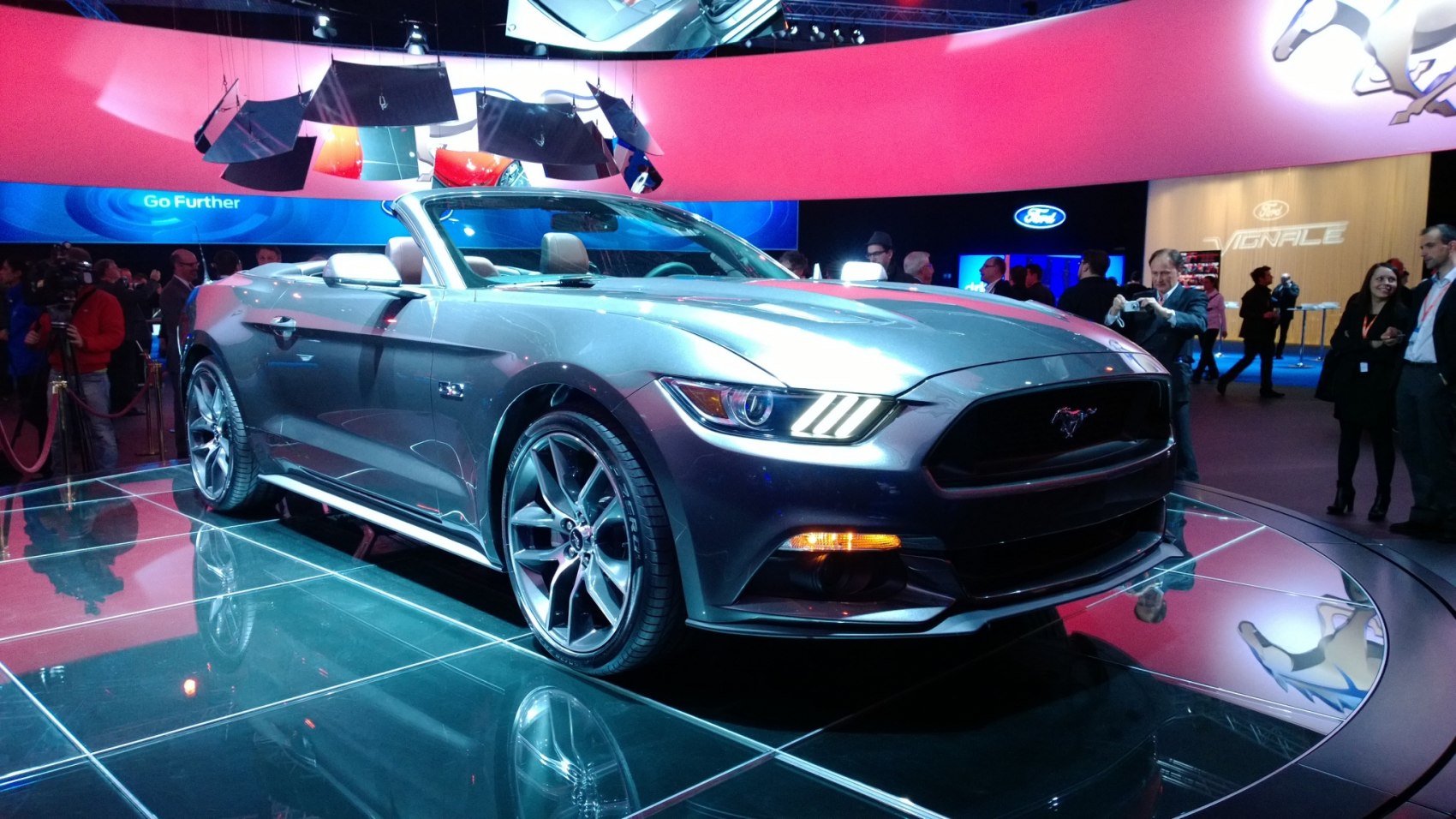 Convertible Mustang with sharp headlights and alloy wheels