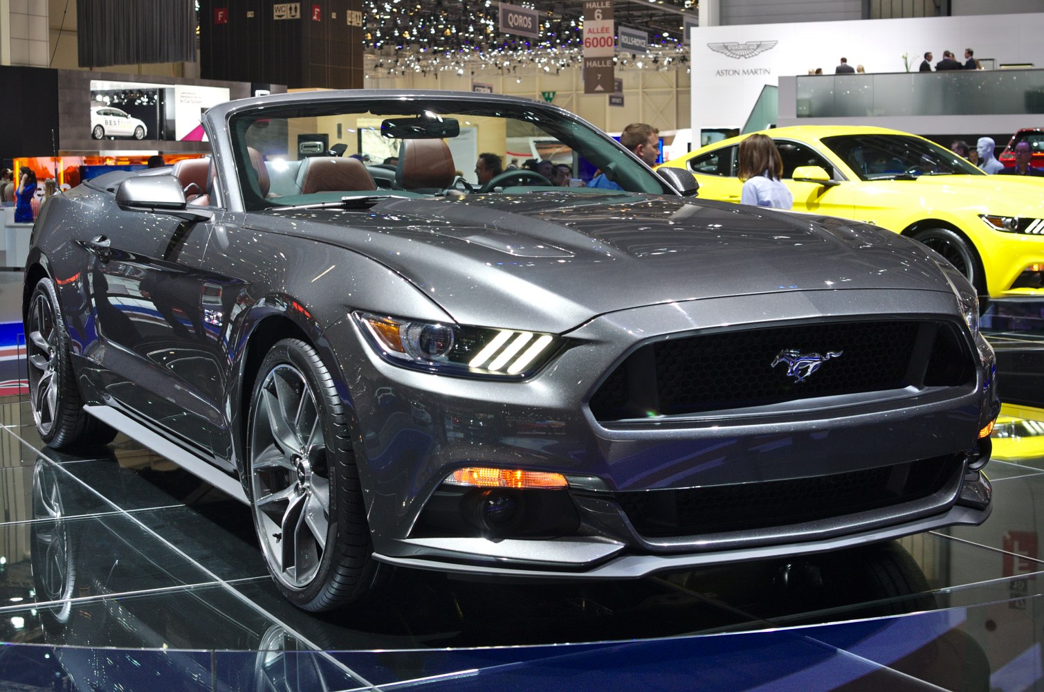 Convertible sports car front with distinctive grille and LED headlights