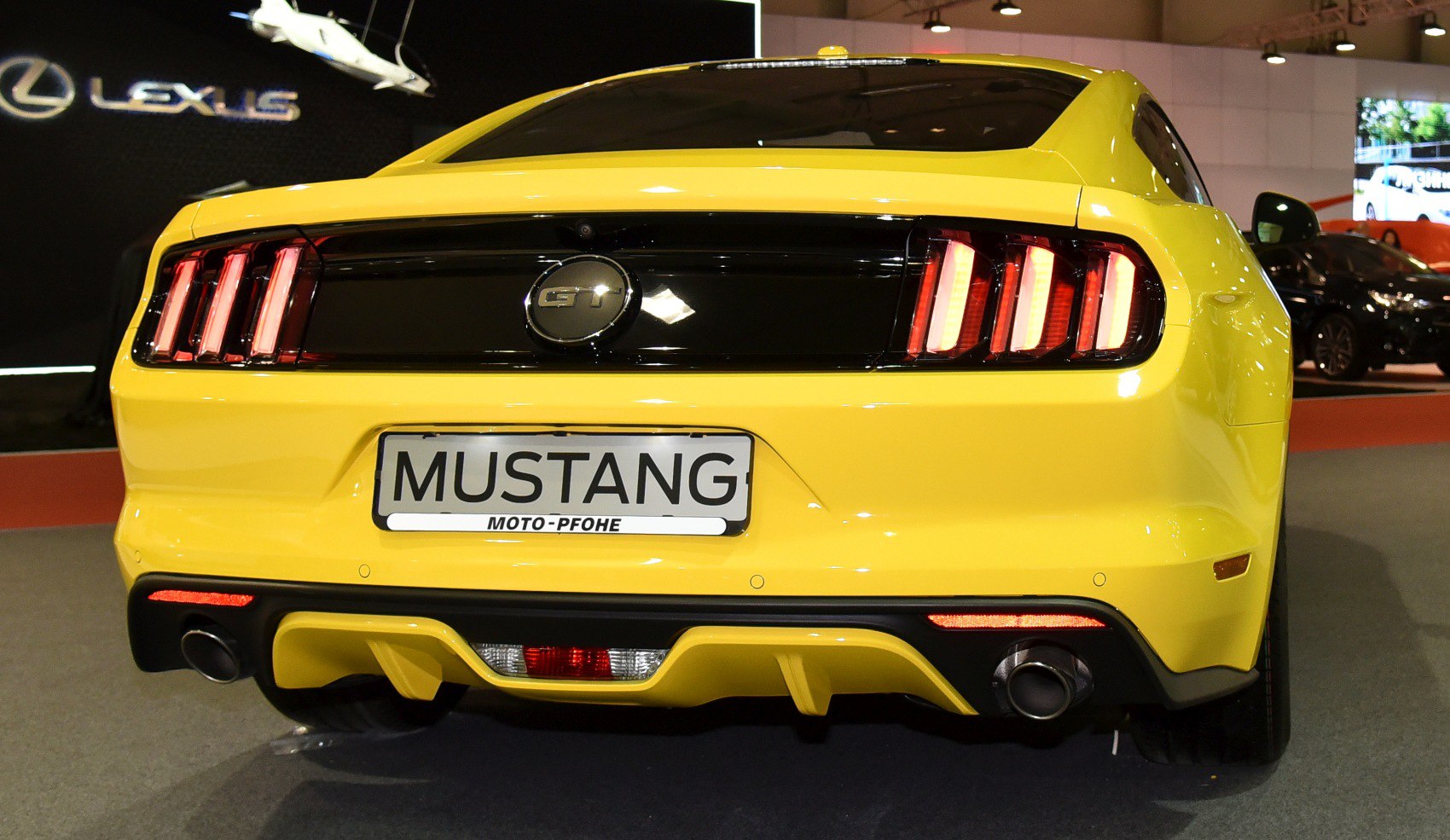 Rear view with GT badge and triple vertical tail lights