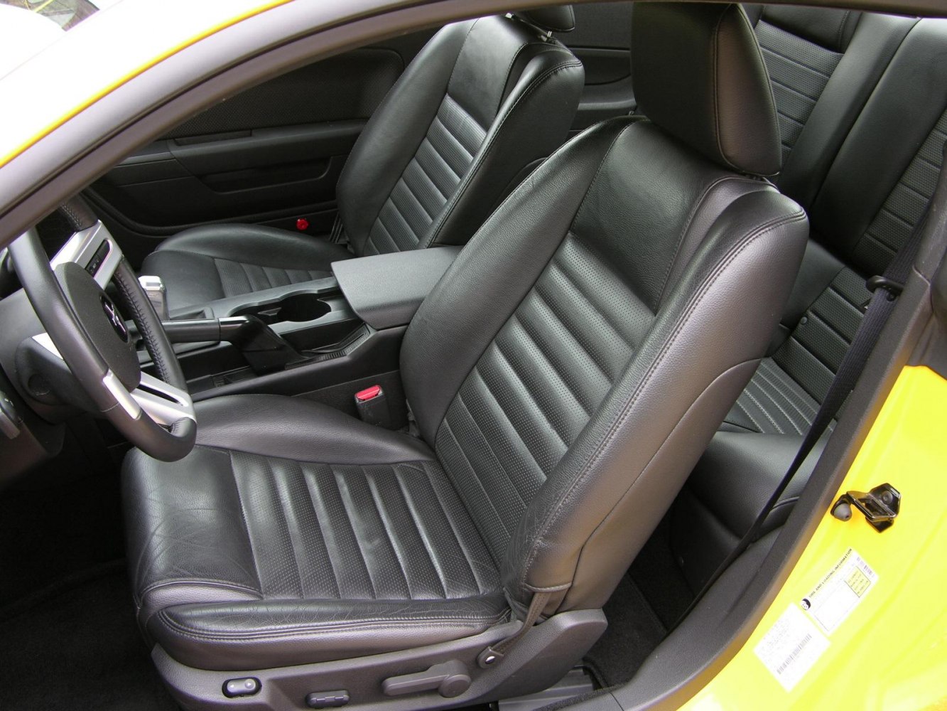 Black leather interior front bucket seats and center console