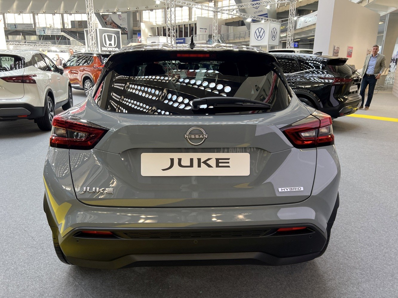 Rear view with distinct taillights and hybrid badge