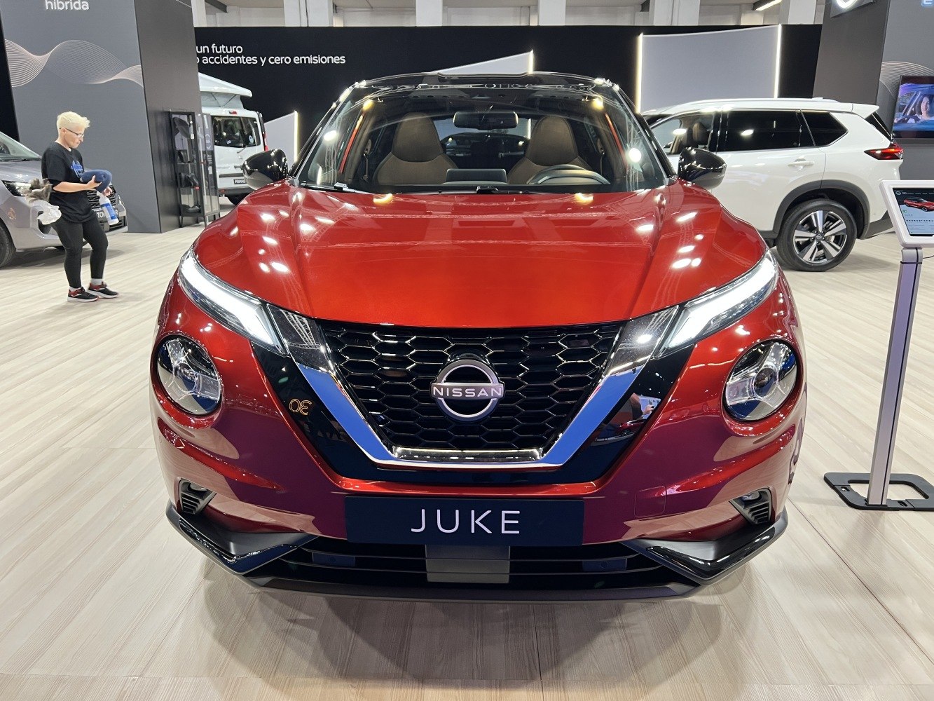 Compact SUV front with honeycomb grille and distinctive headlights