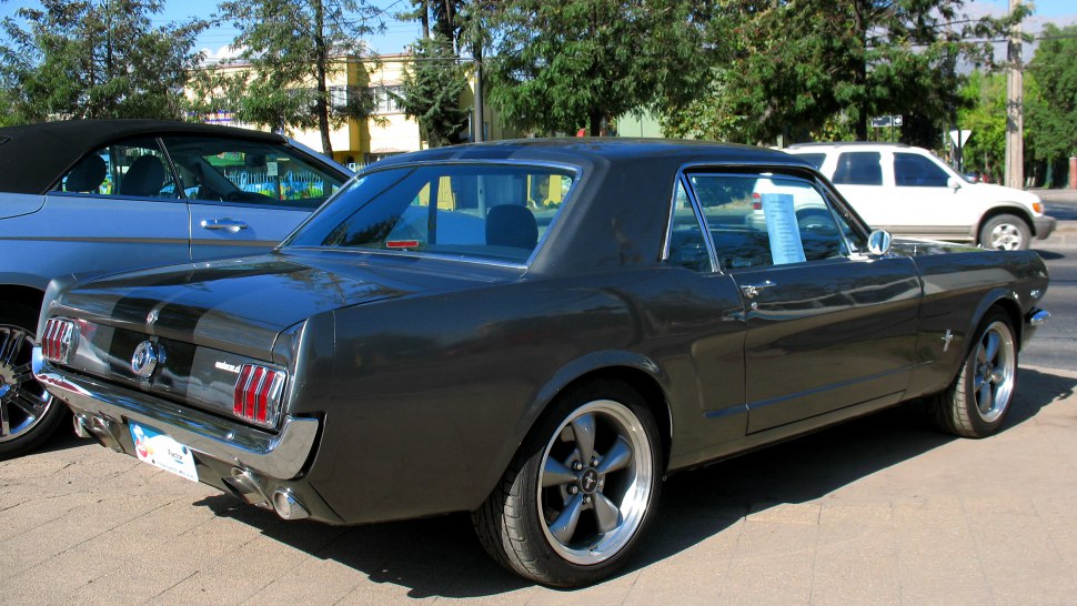 Retro rear view with iconic tail lights and dual exhaust