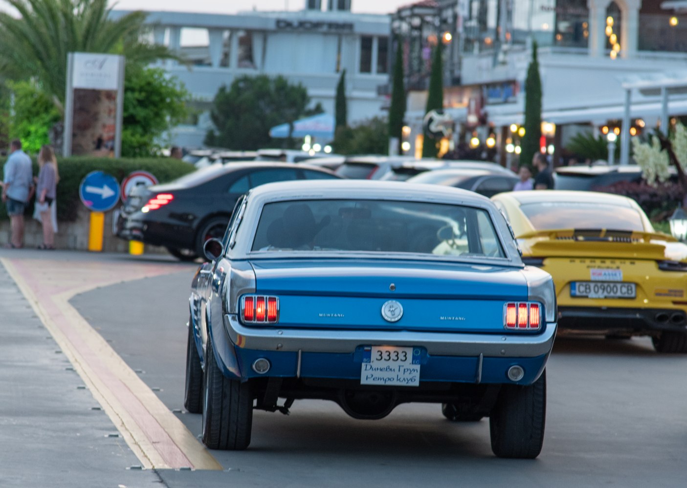 Rear view of vintage muscle car with iconic triple-segment taillights