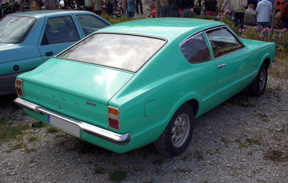 Classic fastback coupe with chrome bumper and rectangular rear lights