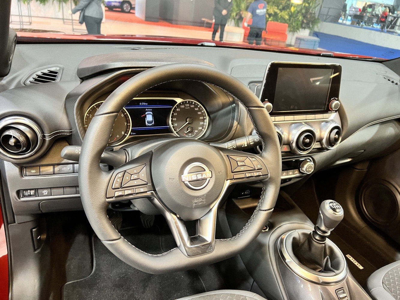 Steering wheel, instrument cluster, infotainment screen, manual gear shift knob