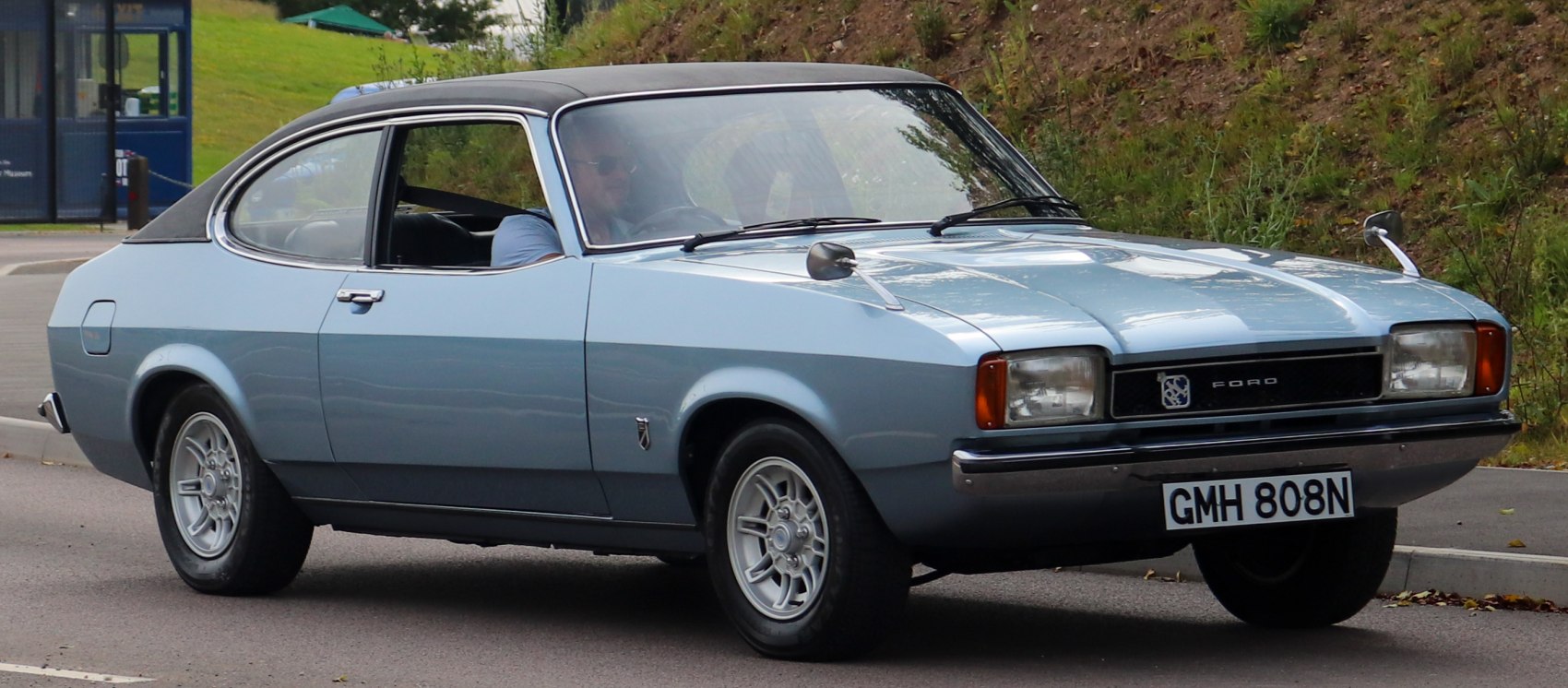 Two-door coupe with vinyl roof and alloy wheels