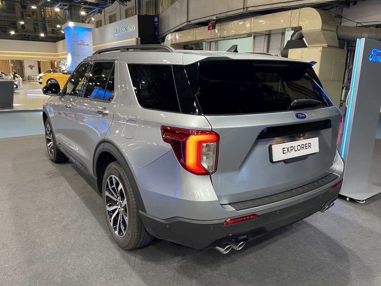 Rear view of a modern SUV with LED tail lights and dual exhaust tips