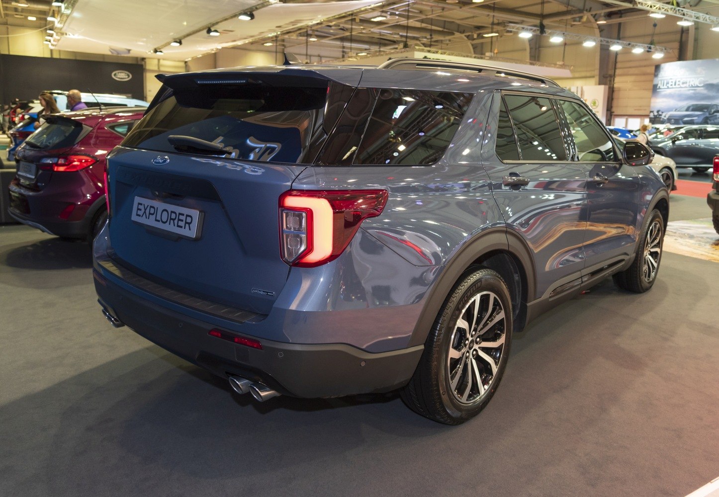 Rear view of SUV with LED tail lights and dual exhaust