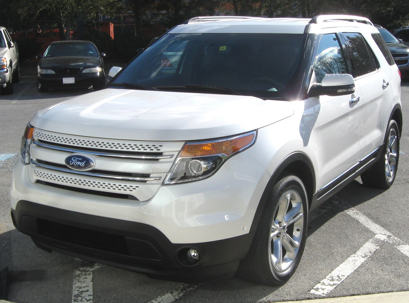 SUV front view with chrome grille and modern headlights