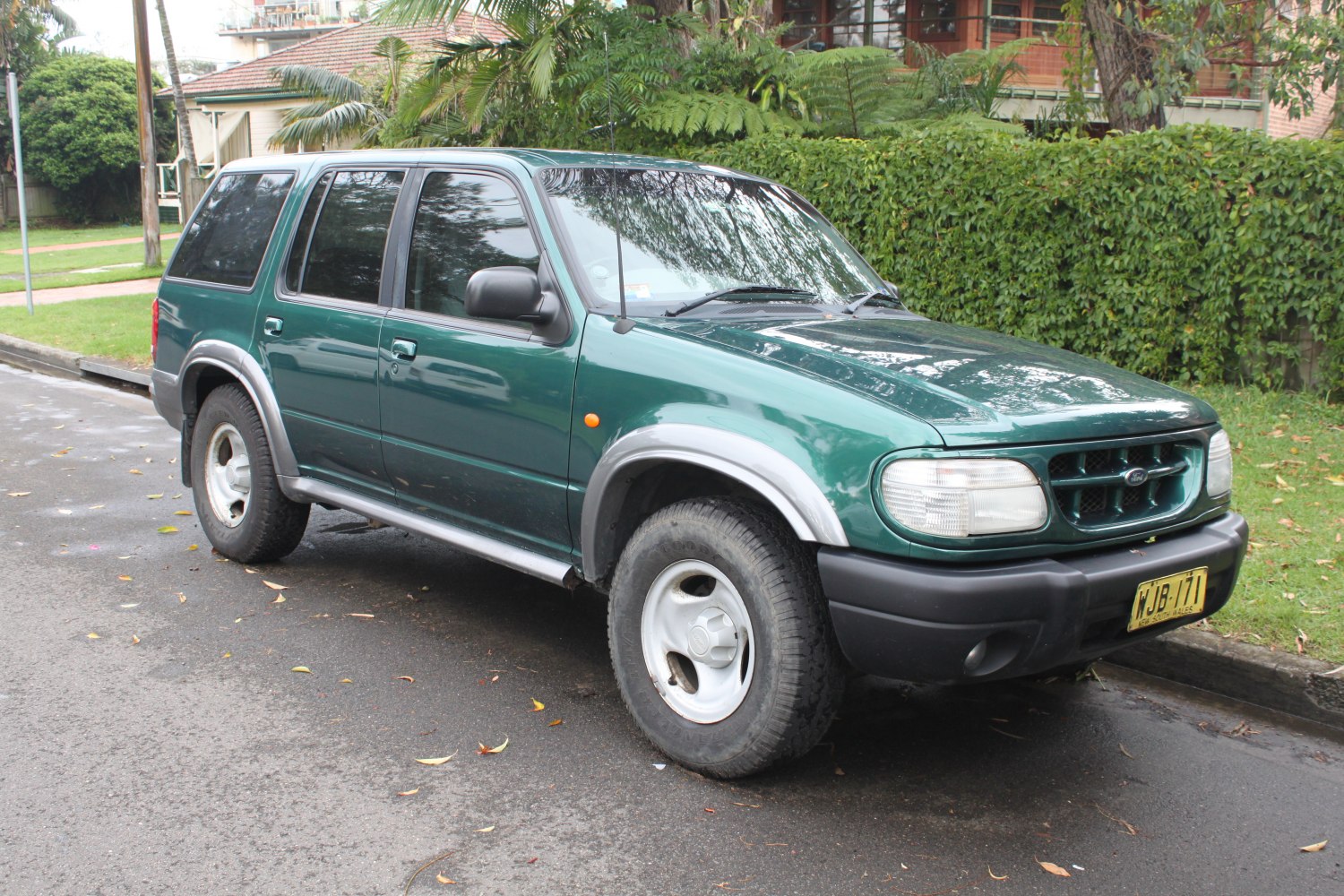 SUV with rounded headlights and rugged tires