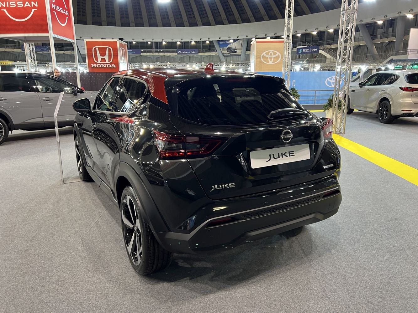 Rear view of compact SUV with modern tail lights and black finish
