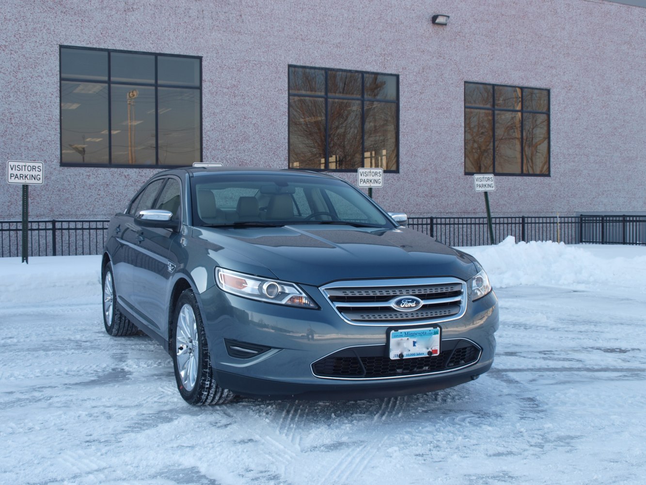 Front view showing chrome grille and sleek headlights