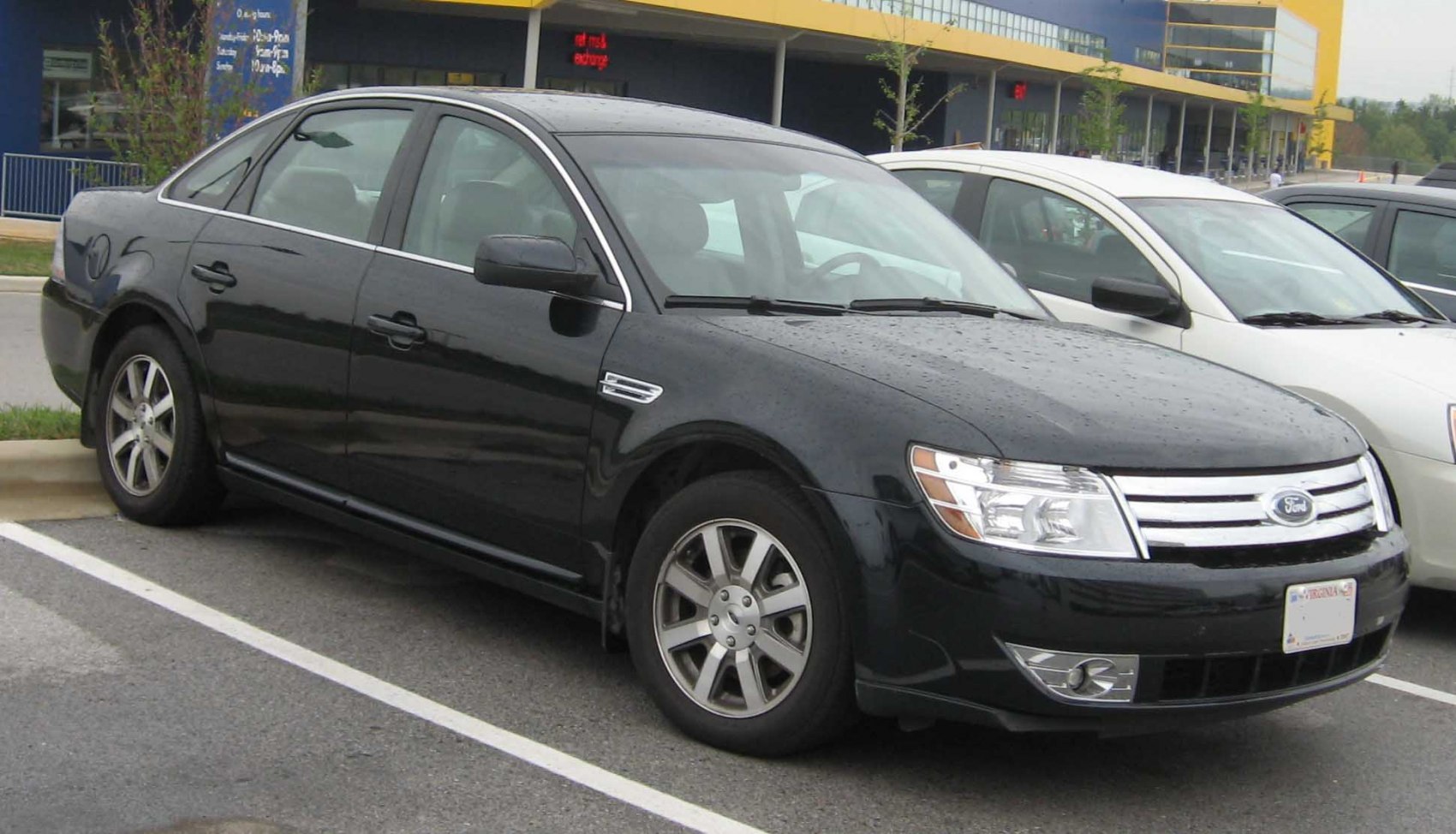 Mid-size sedan with chrome front grille and alloy wheels
