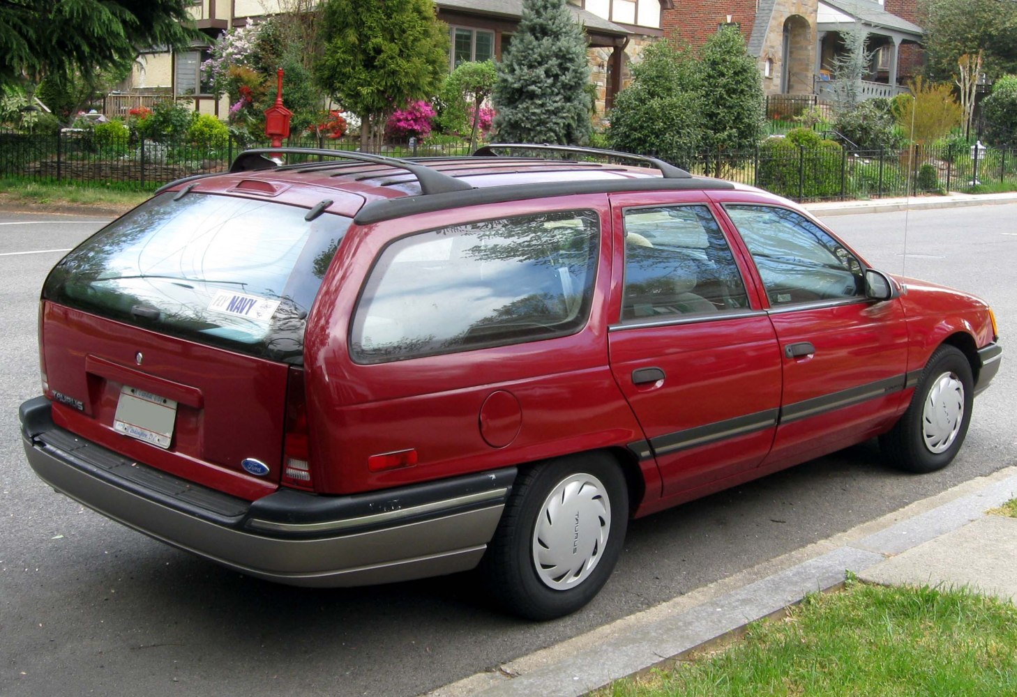 Station wagon with roof rails and large rear hatchback window