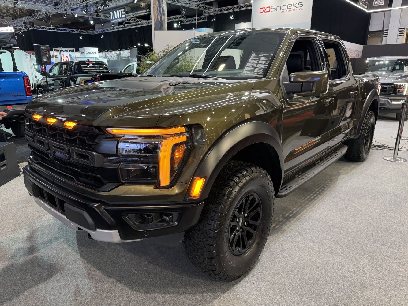 Aggressive front LED headlights and rugged off-road tires.
