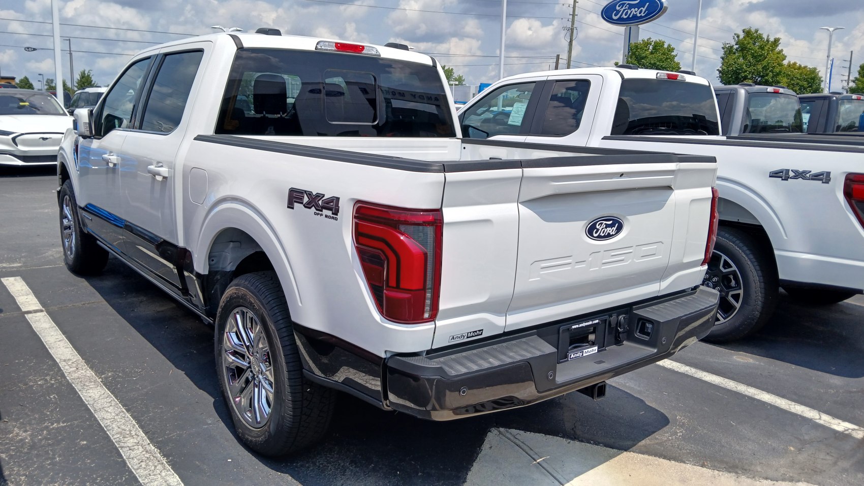 Rear and side view of white pickup with FX4 Off-Road badge