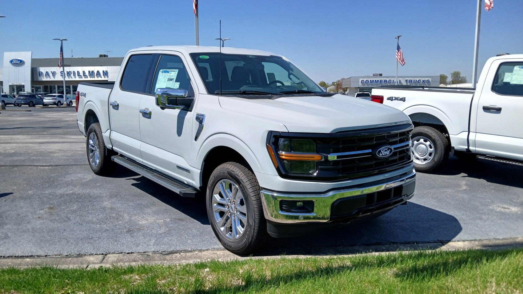 White pickup truck with black grille and LED headlights