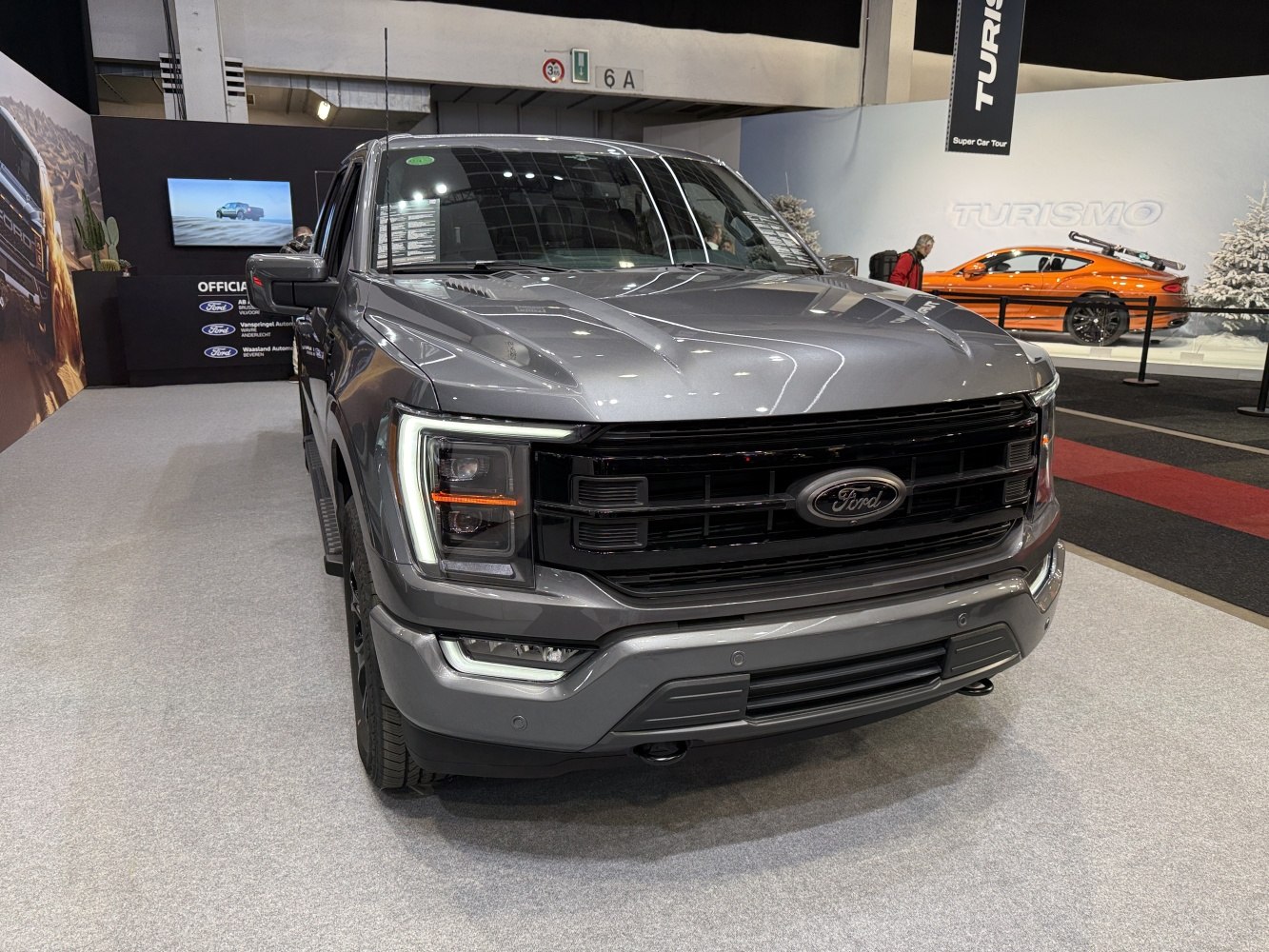 Front grille and LED headlights of a modern pickup