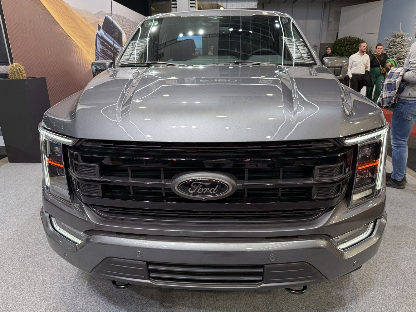 Close-up of front grille and LED headlights