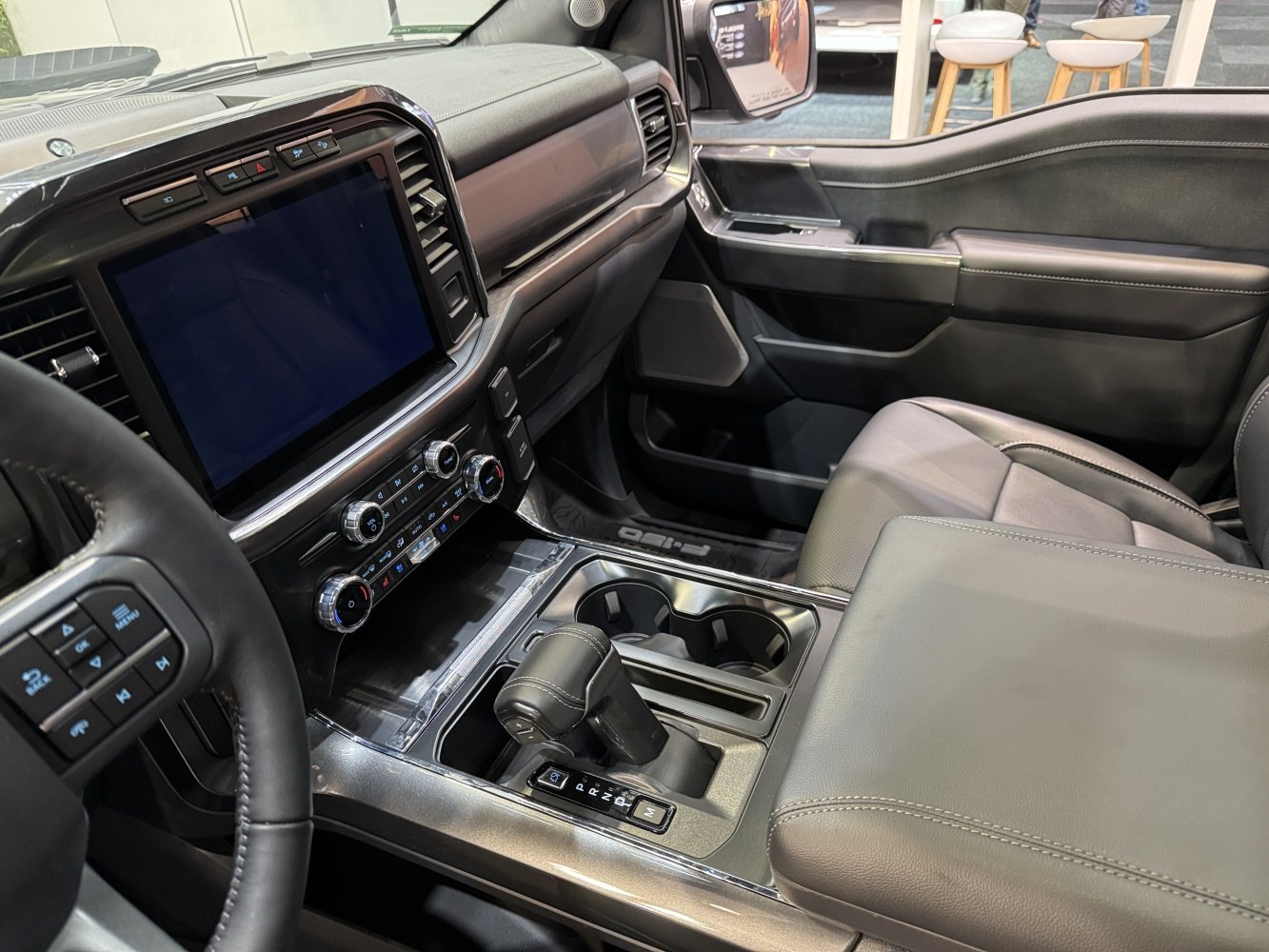 Center console, gear shift, dashboard, and seating details