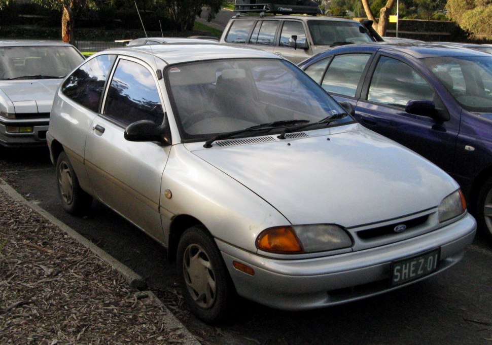Front exterior view of a 1994 compact hatchback with rounded headlamps