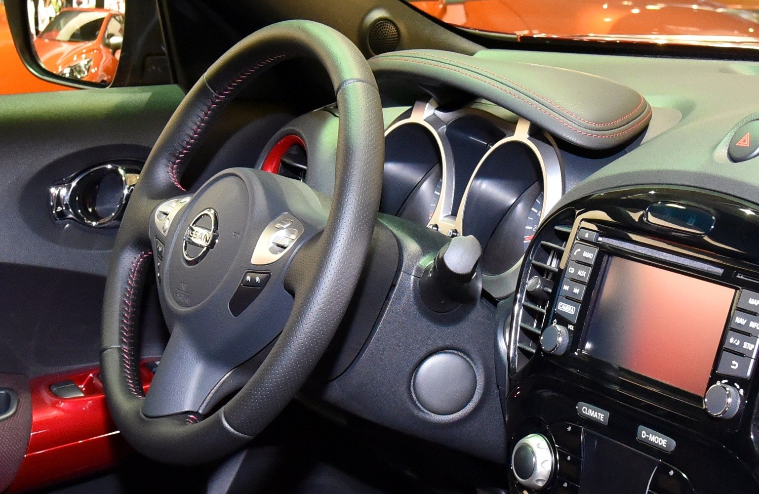 Interior dashboard and steering wheel with infotainment and climate controls