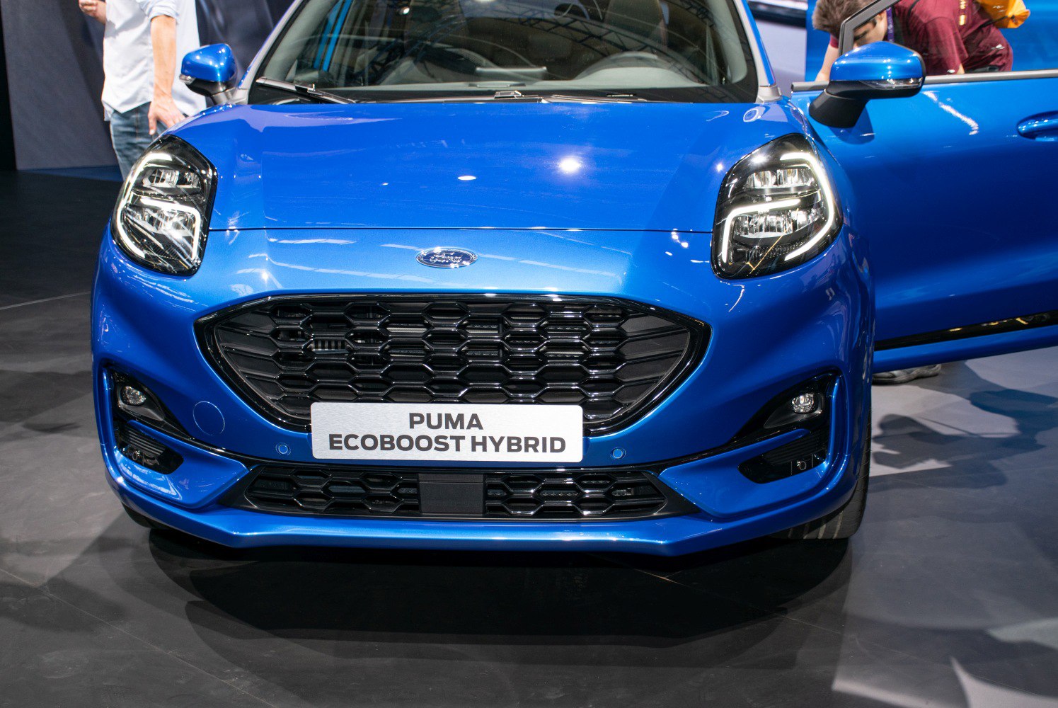 Ford Puma front grille and headlights close-up in blue.