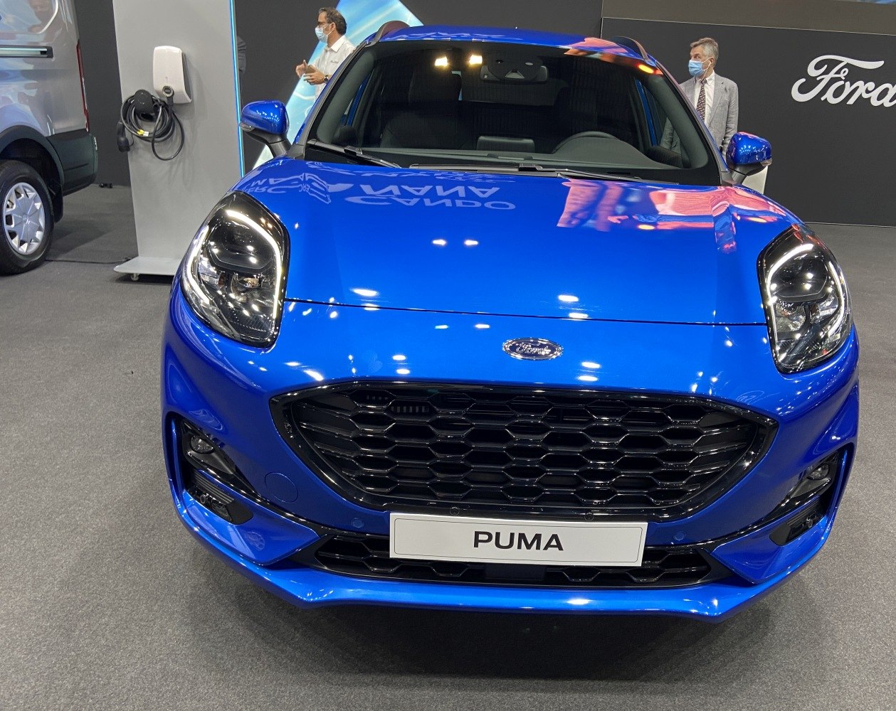 Blue front with black honeycomb grille and LED headlights