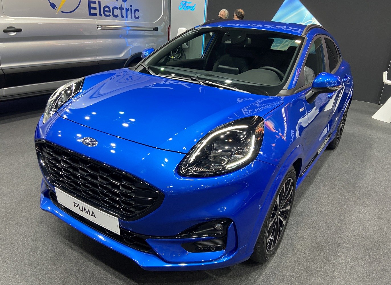 Front angle view with LED headlights and sporty grille