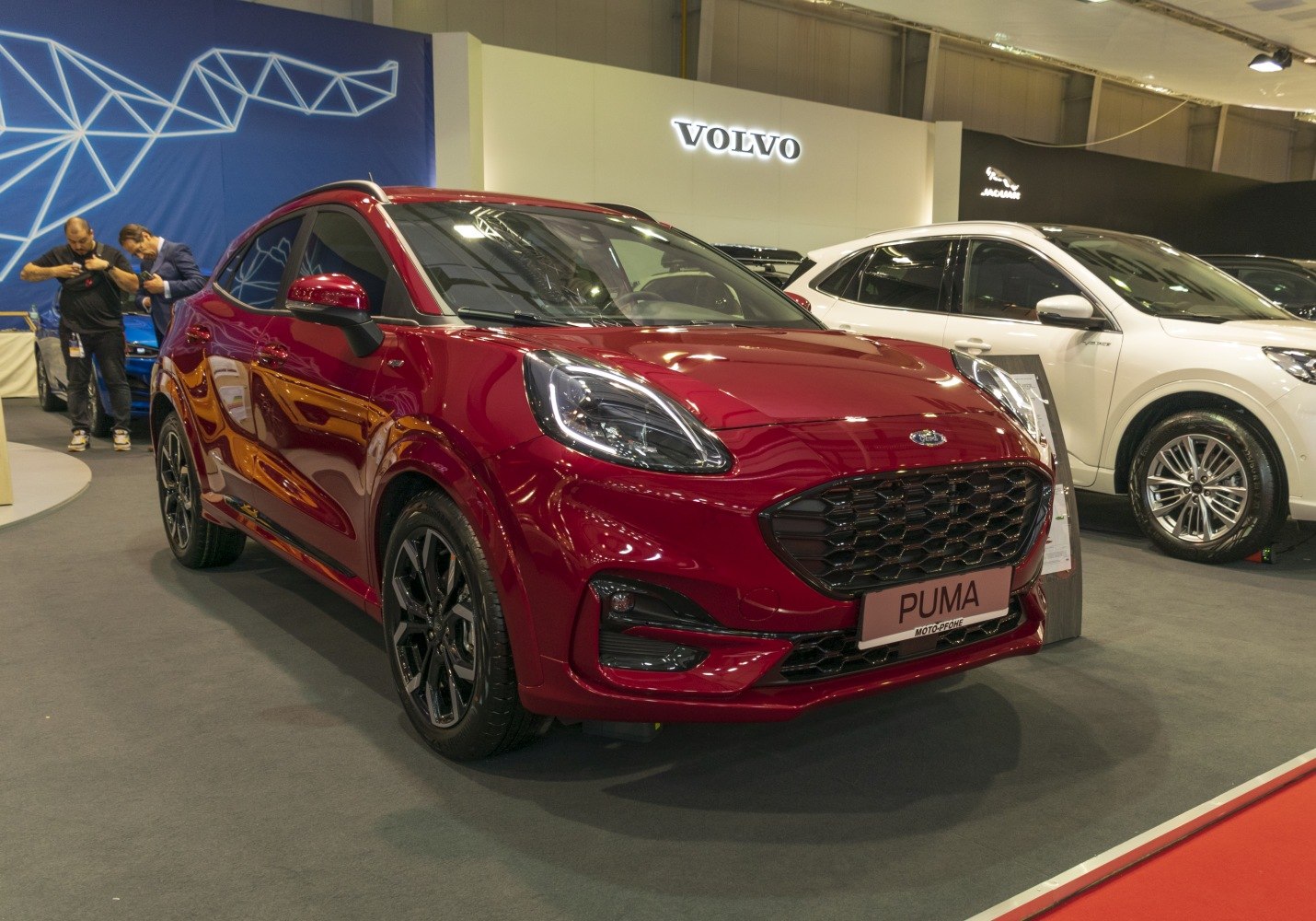 Close-up of front grille and headlights of modern compact SUV