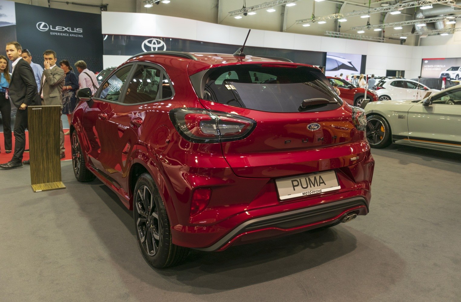 Sporty rear view with distinctive taillights and sleek hatchback design.