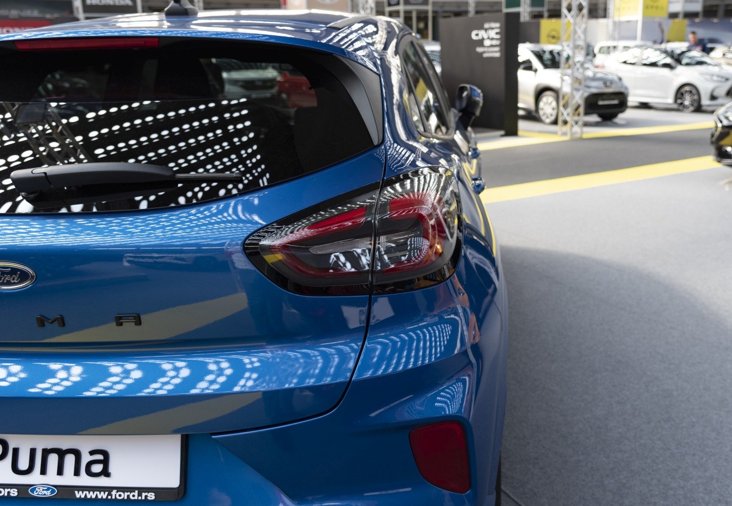 Close-up rear view showing tail light and hatch design.